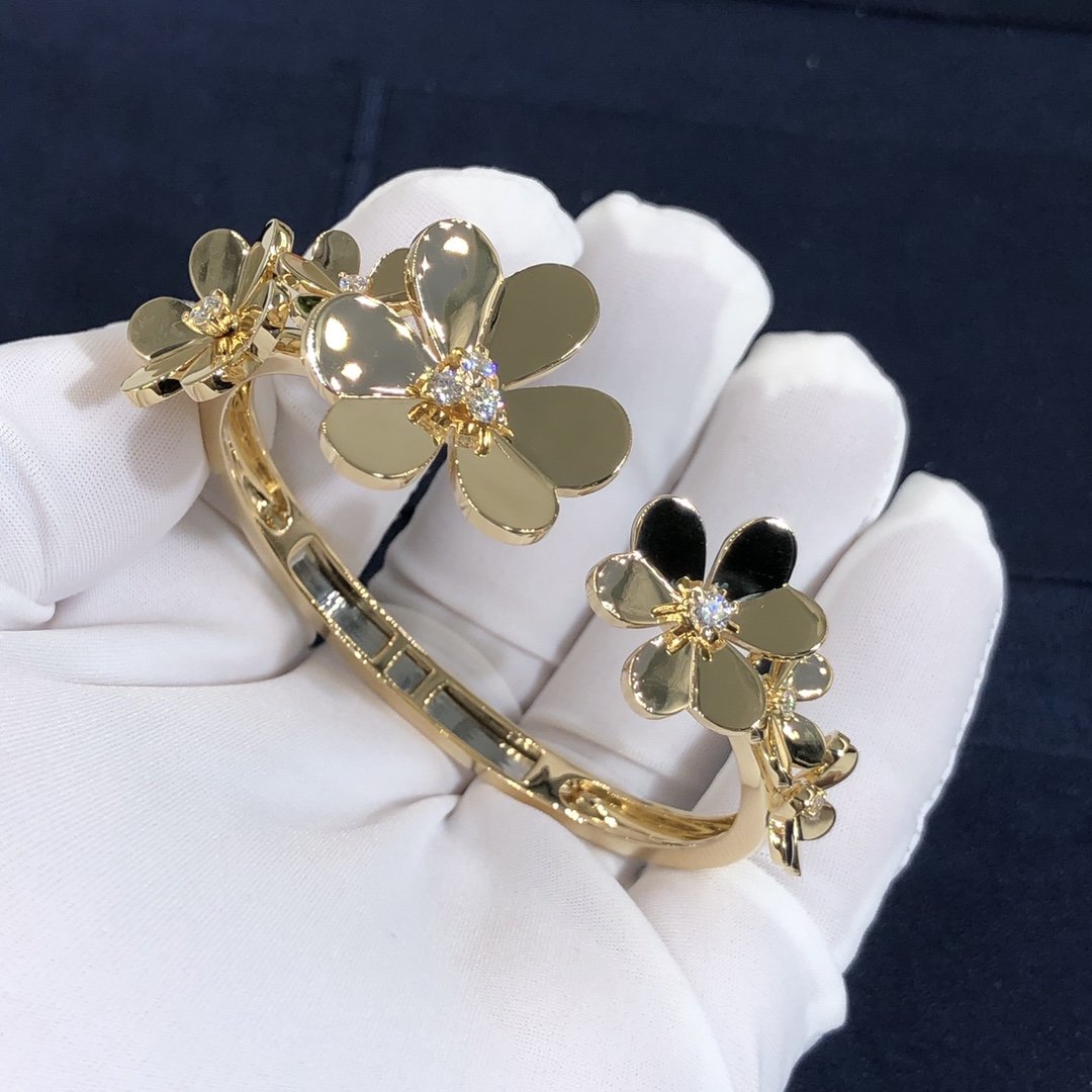 VCA Frivole Bracelet Custom Made in 18K Yellow Gold set with 7 Flowers and 9 Round Diamonds