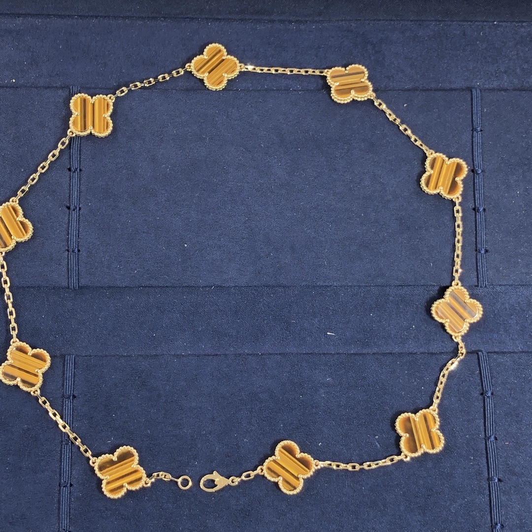 Van Cleef & Arpels Vintage Alhambra 10 Motifs Pendant Custom Made in 18K Yellow Gold with Tiger’s Eye